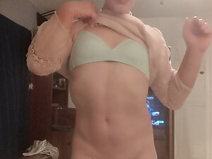 Tranny taking off her panties.
