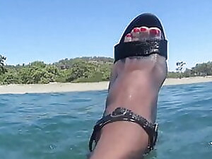 highheel and pantyhose on the beach